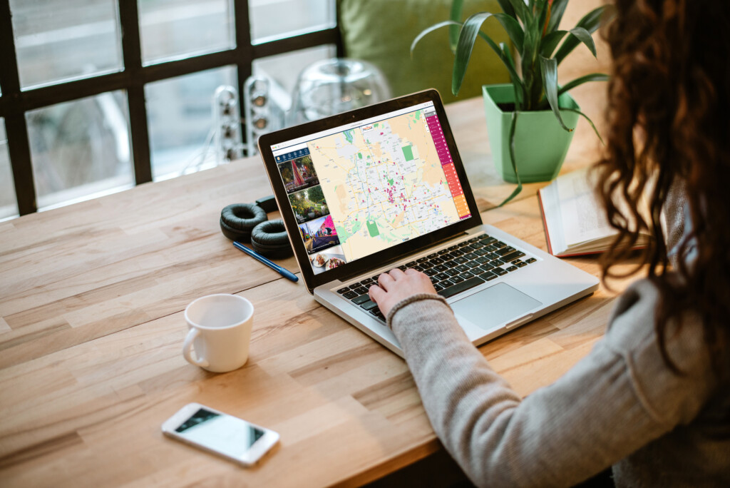 woman using Visit Widget's platform on a laptop